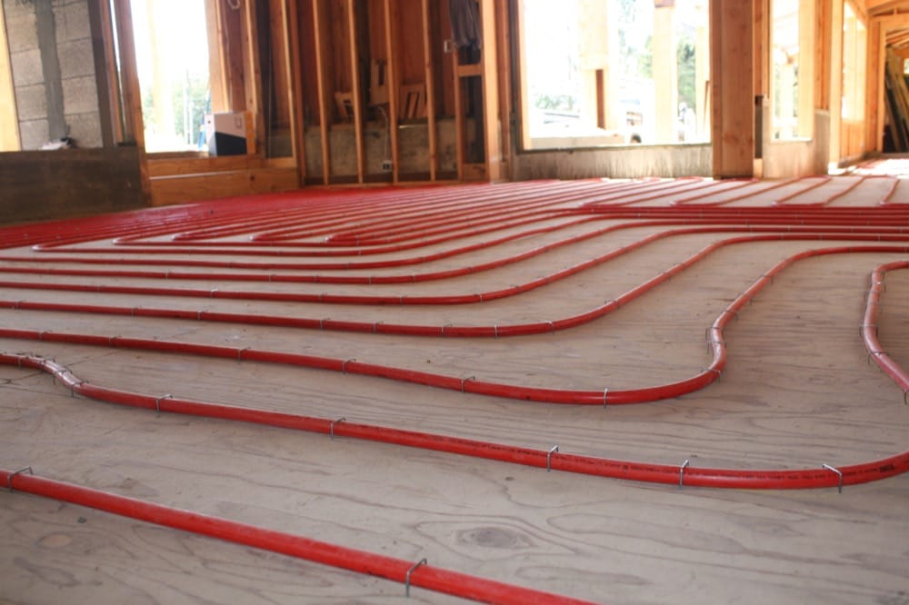 Radiant heating coils spread on the ground