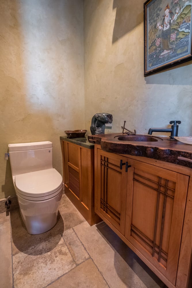 A sink near the toilet