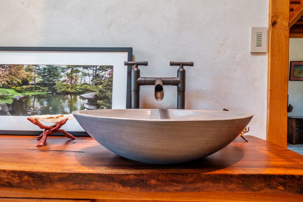 A faucet with a ceramic sink